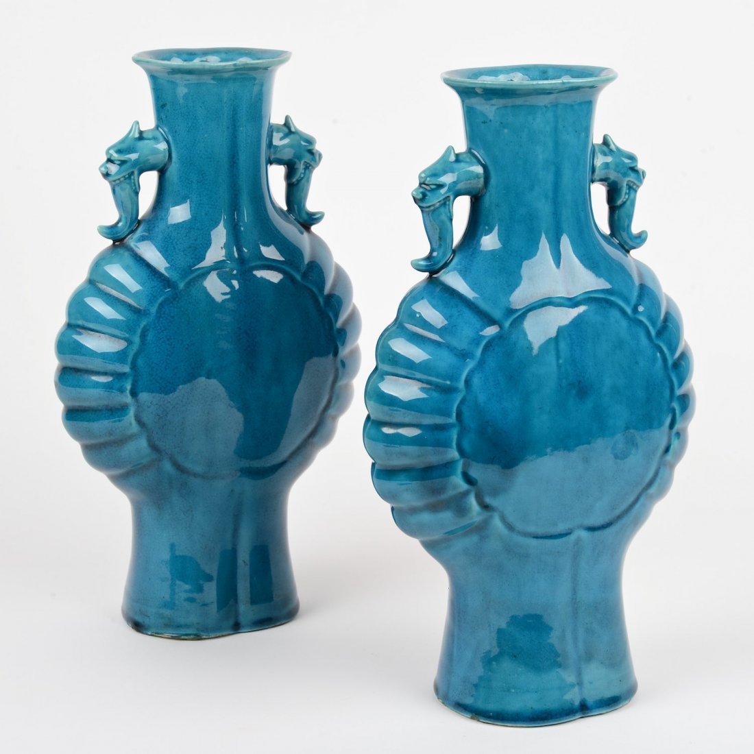 Pair Chinese turquoise glazed moon flasks: Pair Chinese turquoise glazed moon flasks, Late 19th/20th c., 13.25"h x 7.75"w Provenance: the Estate of Edgar M. Bronfman, New York, NY