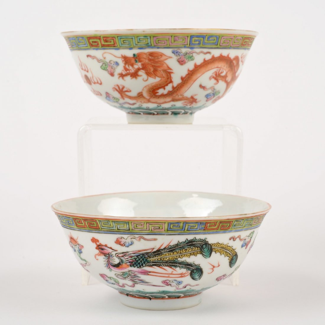 Pair Chinese porcelain dragon bowls: Pair Chinese porcelain dragon bowls, 20th c., bearing overglaze red Qianlong marks, 2.25"h x 5"dia.