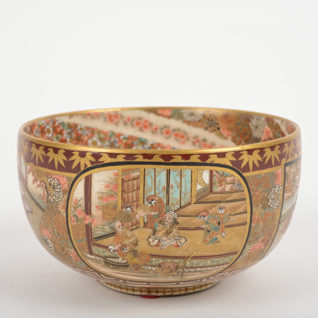 Japanese Satsuma earthenware bowl signed Shizan: Japanese Satsuma earthenware bowl signed Shizan, 19th c., court scenes with floral spiral interior, 2.75"h x 5" dia.