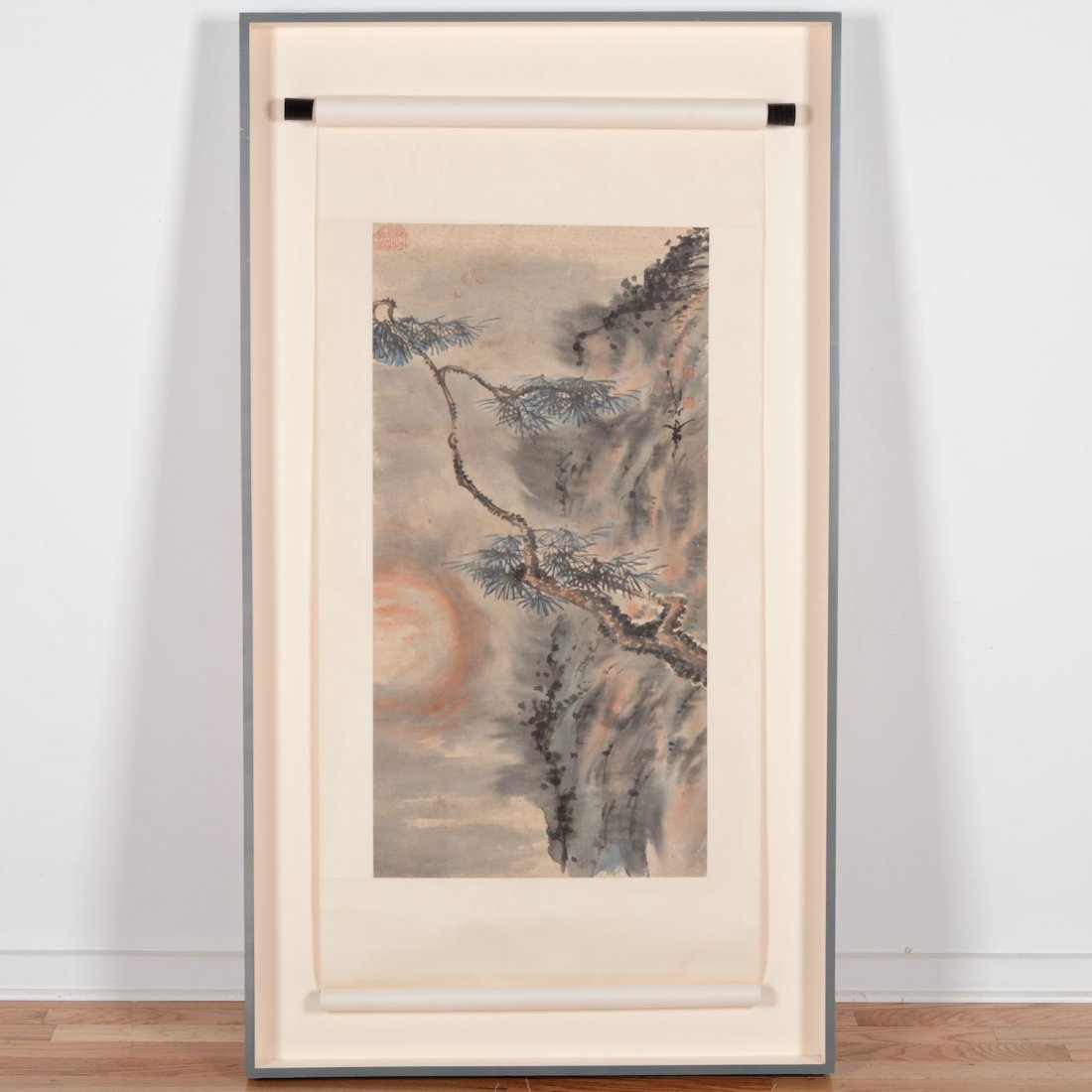 Manner of C.C. Wang (20th c., Chinese), painting: Manner of C.C. Wang (20th c., Chinese), painting, Cypress branch with setting sun, watercolor on paper on silk scroll, signed and sealed upper left and center right, 34" x 17.5" (image), shadowbox fra