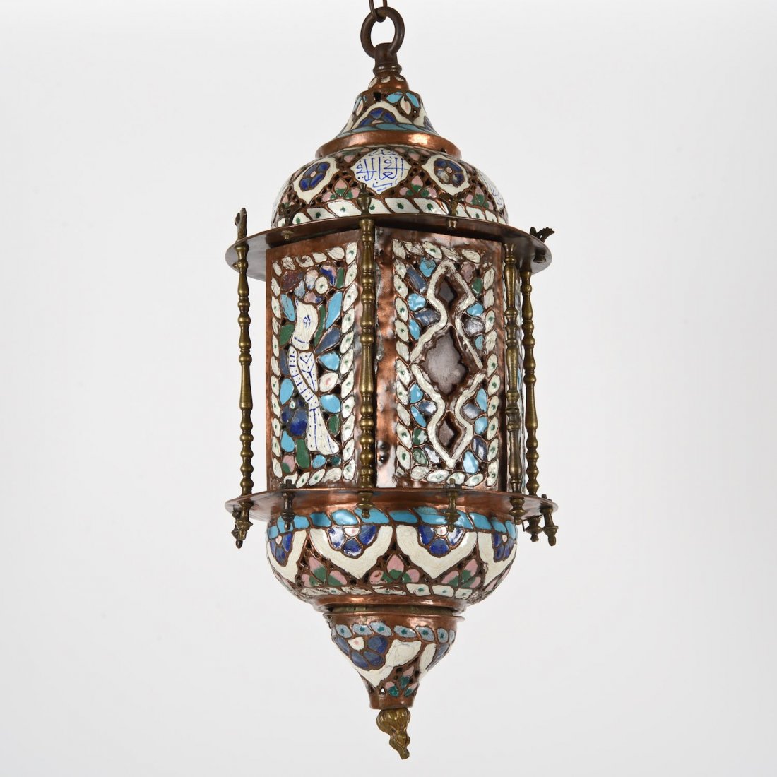 Islamic enameled copper and brass mosque lantern: Islamic enameled copper and brass mosque lantern, 20th c., decorated with birds, flowers and Kufic script, 26"h x 9"dia.