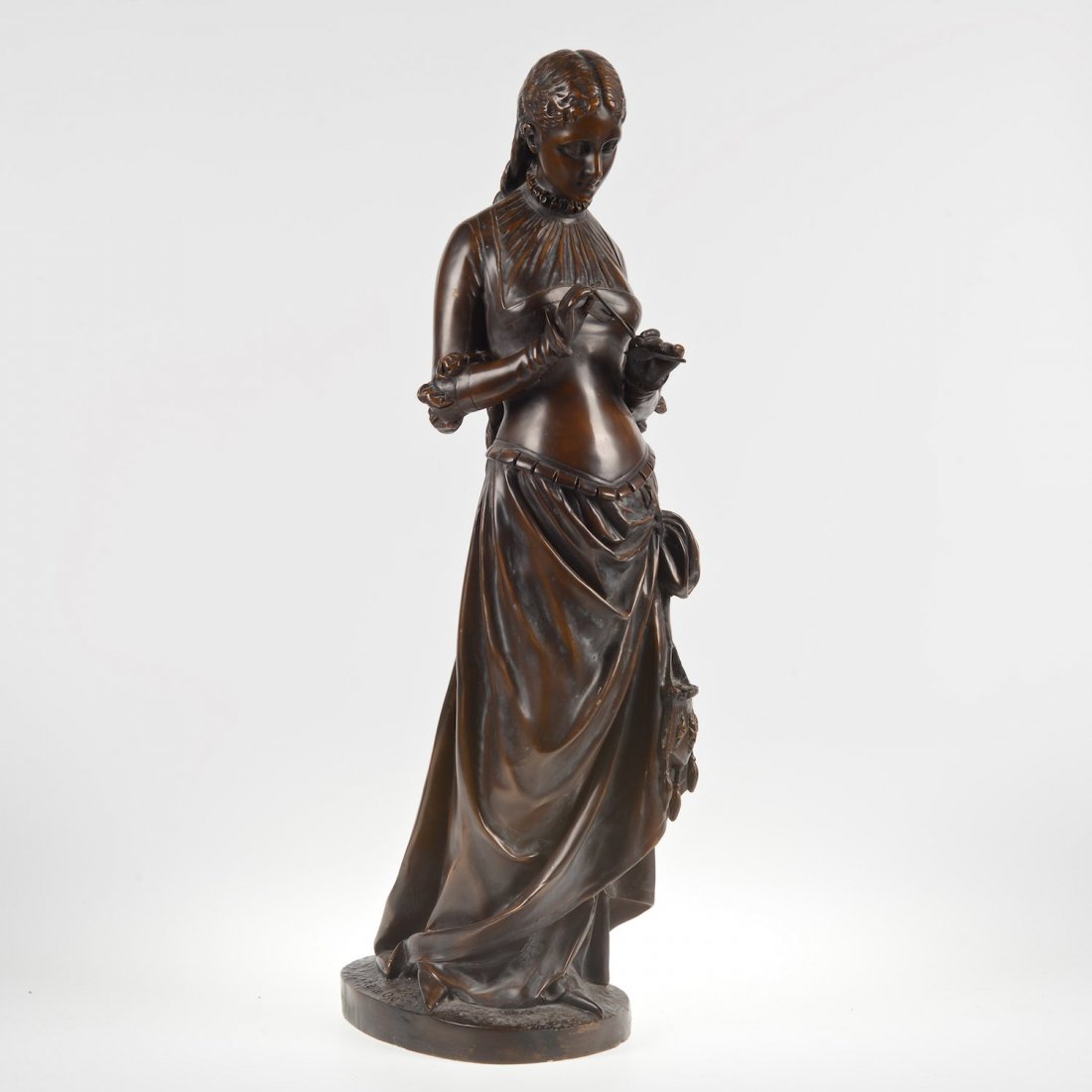 After Pierre Marie Oge (1849-1913, French), sculpture: After Pierre Marie Oge (1849-1913, French), sculpture, Standing woman with long braids, bronze with brown patina, inscribed "Pierre Oge - Paris" - 30.5"h x 7.5"w x 10.75"d
