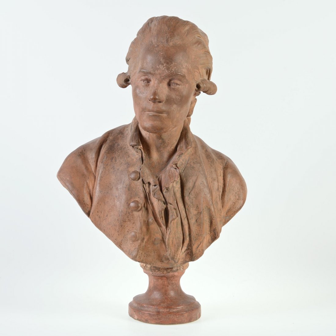 French terra cotta bust of a gentleman: French terra cotta bust of a gentleman, 18th/19th c., possibly the work of Nicolas Joseph Laurent Gilbert (1750-1780), unmarked, 26"h x 17"w x 12"d