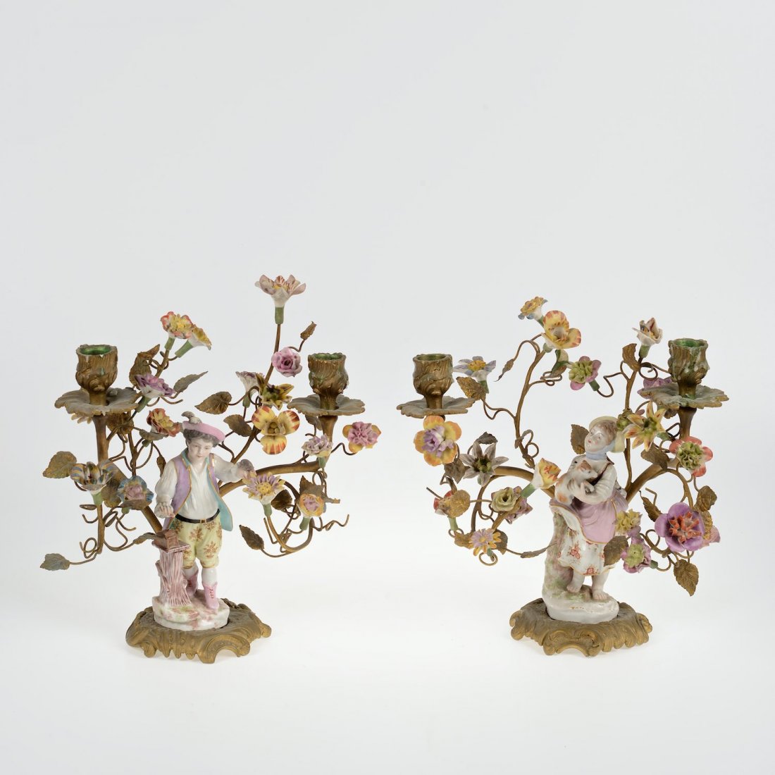Pair Meisssen style porcelain and bronze candelabra: Pair Meisssen style porcelain and bronze candelabra, 19th/20th c., 11.5"h x 10.75"l x 5"d Provenance: from the Estate of Edgar M. Bronfman, New York, NY