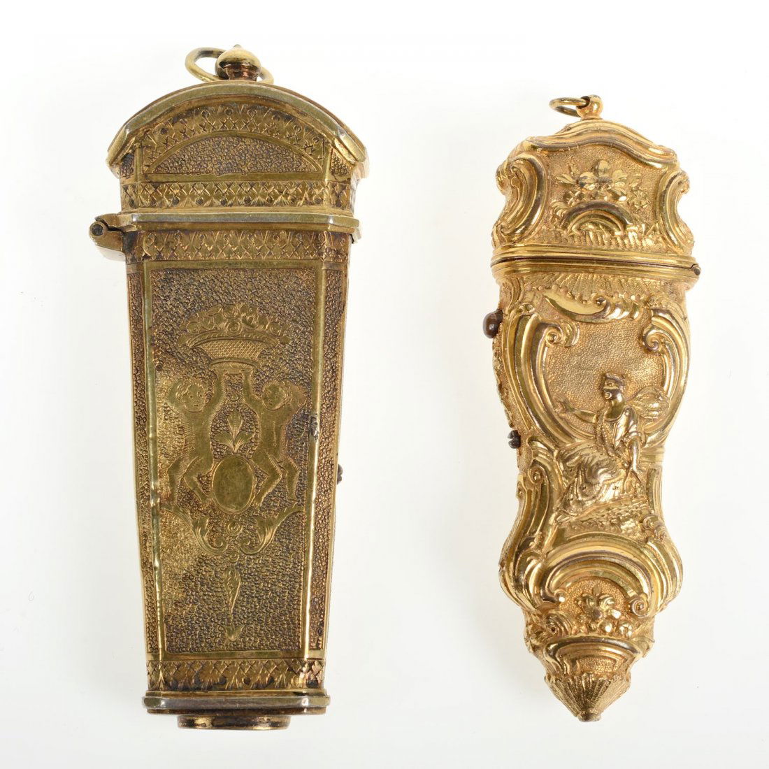 (2) antique Continental gilt metal etui cases: (2) antique Continental gilt metal etui cases, 18th/19th c., one containing 5 implements, the other case empty, 3.25"h x 1"l x .5"d and 3.75"h x 1.5"l x .75"d