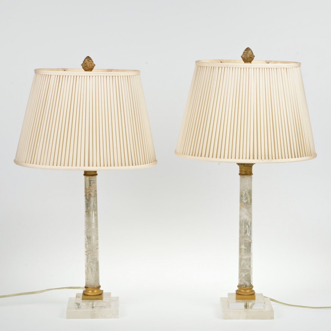 Nice pair bronze mounted rock crystal column lamps: Nice pair bronze mounted rock crystal column lamps, 19th c., 12"h x 4"l x 4"d (excl. fittings), 20"h x 26.5"l x 8"d (total) Provenance: from the Estate of Edgar M. Bronfman, New York, NY