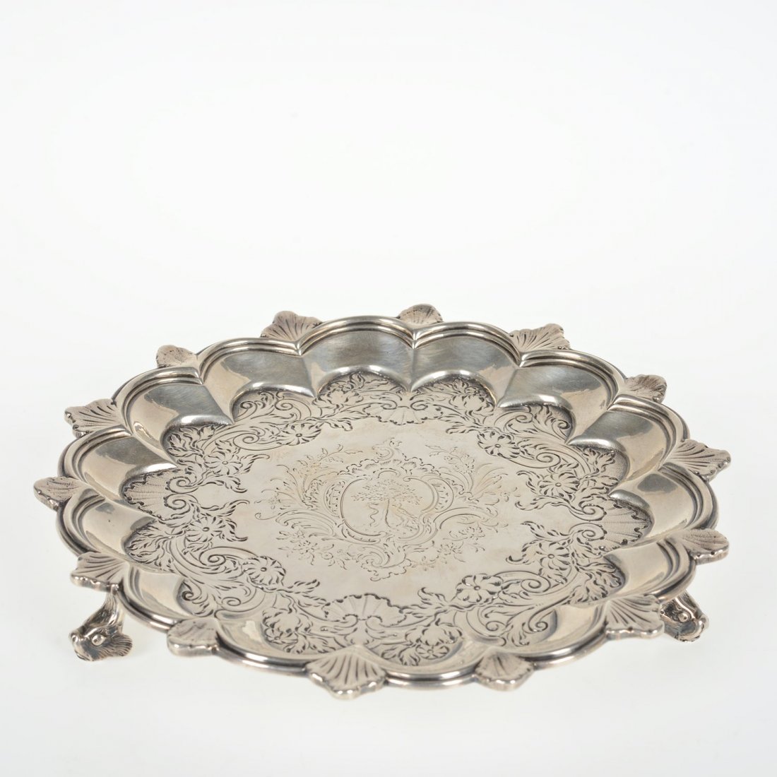 George II sterling silver salver: George II sterling silver salver, London, circa 1751, maker's mark probably that of John Jacobs, scalloped rim with dolphin head feet, 1"h x 6.5" dia., approx. 8.03 ozt. Provenance: 1830 Rittenhouse S