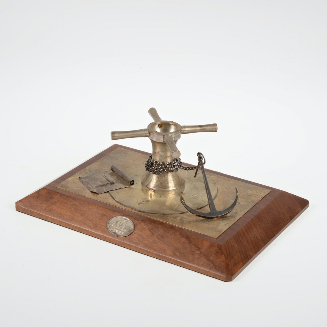 English silver, mahogany nautical desk accessory: English silver, mahogany nautical desk accessory, London, circa 1994, maker's mark "DG", anchor and compass theme, with presentation plaque, 5"h x 10.75"w x 7.75"d
