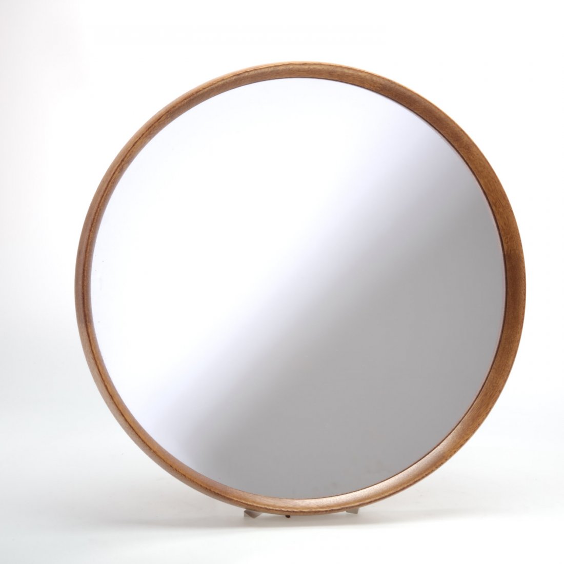 Uno & Osten Kristiansson round oak mirror: Uno & Osten Kristiansson round oak mirror, Circa 1960s, by Luxus in Vittsjo, Sweden, "Made in Sweden" label verso, 17.5"dia.