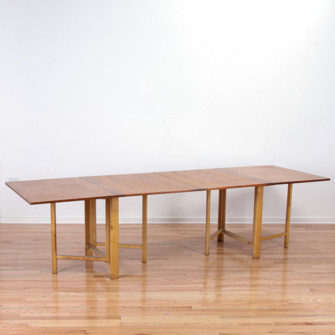 Bruno Mathsson "Maria" ash folding table: Bruno Mathsson "Maria" ash folding table, Circa 1967, marked "Firma Karl Mathsson, Made in Sweden", 29"h x 35.5"w x 5"d (closed), 29"h x 110.5"l x 35.5"w (open) Provenance: The Estate of Edgar M. Bron