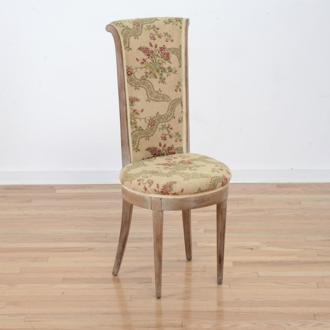 James Mont upholstered limed wood side chair: James Mont upholstered limed wood side chair, Circa 1940s, floral linen seat and back, round tapered legs, 39"h x 16"w x 19"d