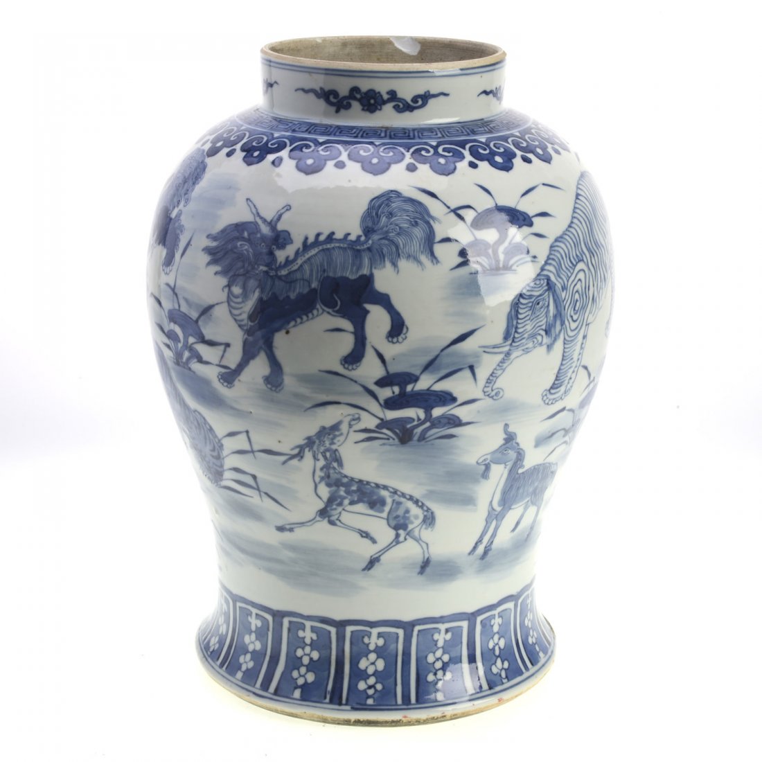 Chinese blue and white porcelain jar: Chinese blue and white porcelain jar, 19th c., decorated with elephants, lions, and foo dogs among reeds, unmarked, 14.75"h x 10"dia.