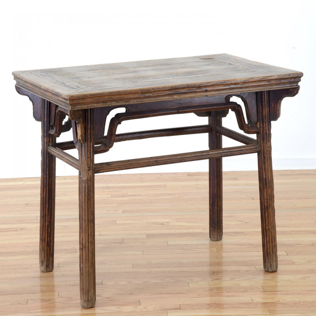 Chinese hardwood altar table: Chinese hardwood altar table, 19th c., with pierced apron and reeded legs, 34"h x 41"w x 25.5"d