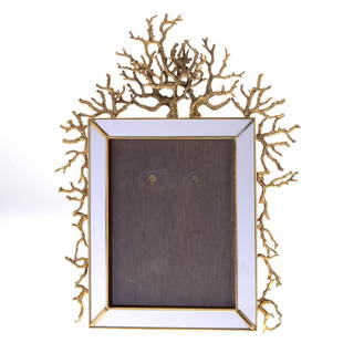 Rare "Coral" easel frame by Robert Goossens, Paris: Rare "Coral" easel frame by Robert Goossens, Paris, Circa 1927, gilt bronze simulated coral branches surmounting a mirrored glass and brass frame, signed "Robert Goossens, Paris", to stand, 13"h x 10"