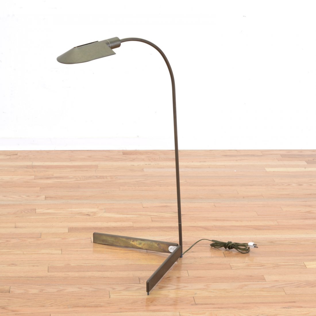 Cedric Hartman brass floor lamp: Cedric Hartman brass floor lamp, Circa 1970s, Lucite switch, cantilever with V-form base, stamped "Cedric Hartman", to underside, 34"h x 22"w x 21"d
