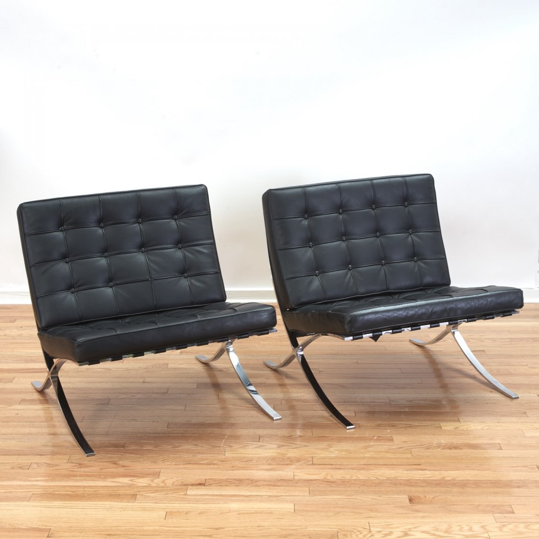 Pair Mies Van der Rohe style barcelona chairs: Pair Mies Van der Rohe style barcelona chairs, 20th c., with label "Bucciarelli Made in Italy", 30"h x 30"w x 29.5"d
