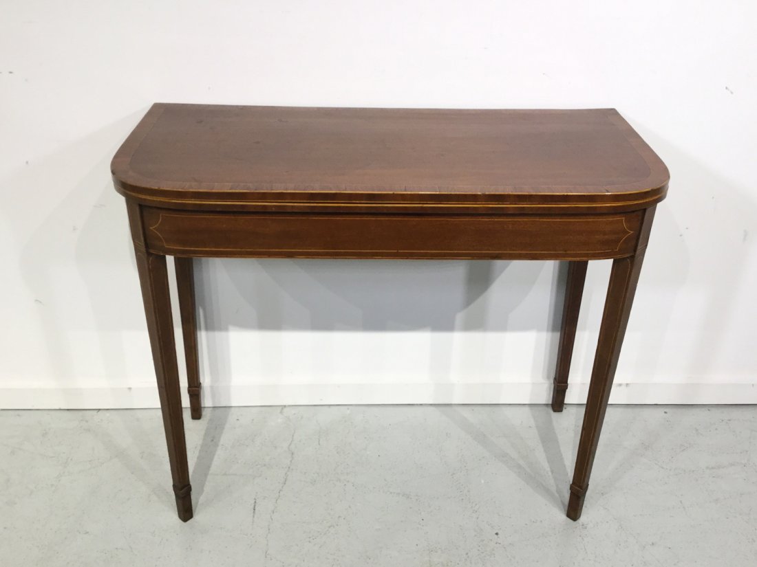George III inlaid mahogany games table: George III inlaid mahogany games table, 18th/19th c., 28.75"h x 35.75"w x 17"d (folded)