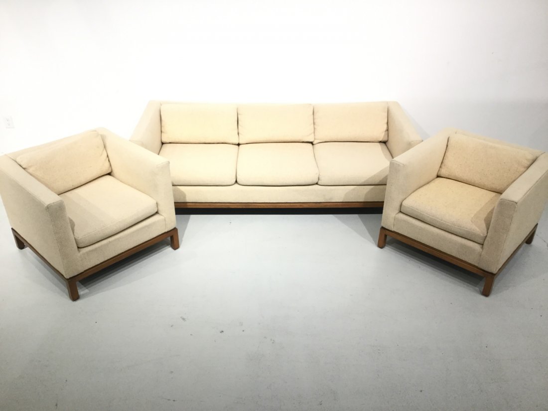 Dunbar style Modernist living room suite: Dunbar style Modernist living room suite, 20th c., 27"h x 80"w x 33"d (couch), 27"h x 31"w x 32"d (chairs) Provenance: AT&T Corporate Collection