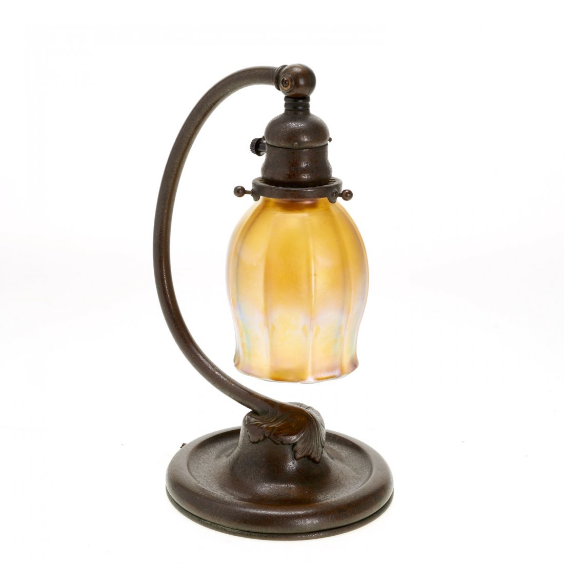 Tiffany Studios bronze and favrile desk lamp: Tiffany Studios bronze and favrile desk lamp, 20th c., stamped "TIFFANY STUDIOS NEW YORK #637", 12"h x 6"dia.