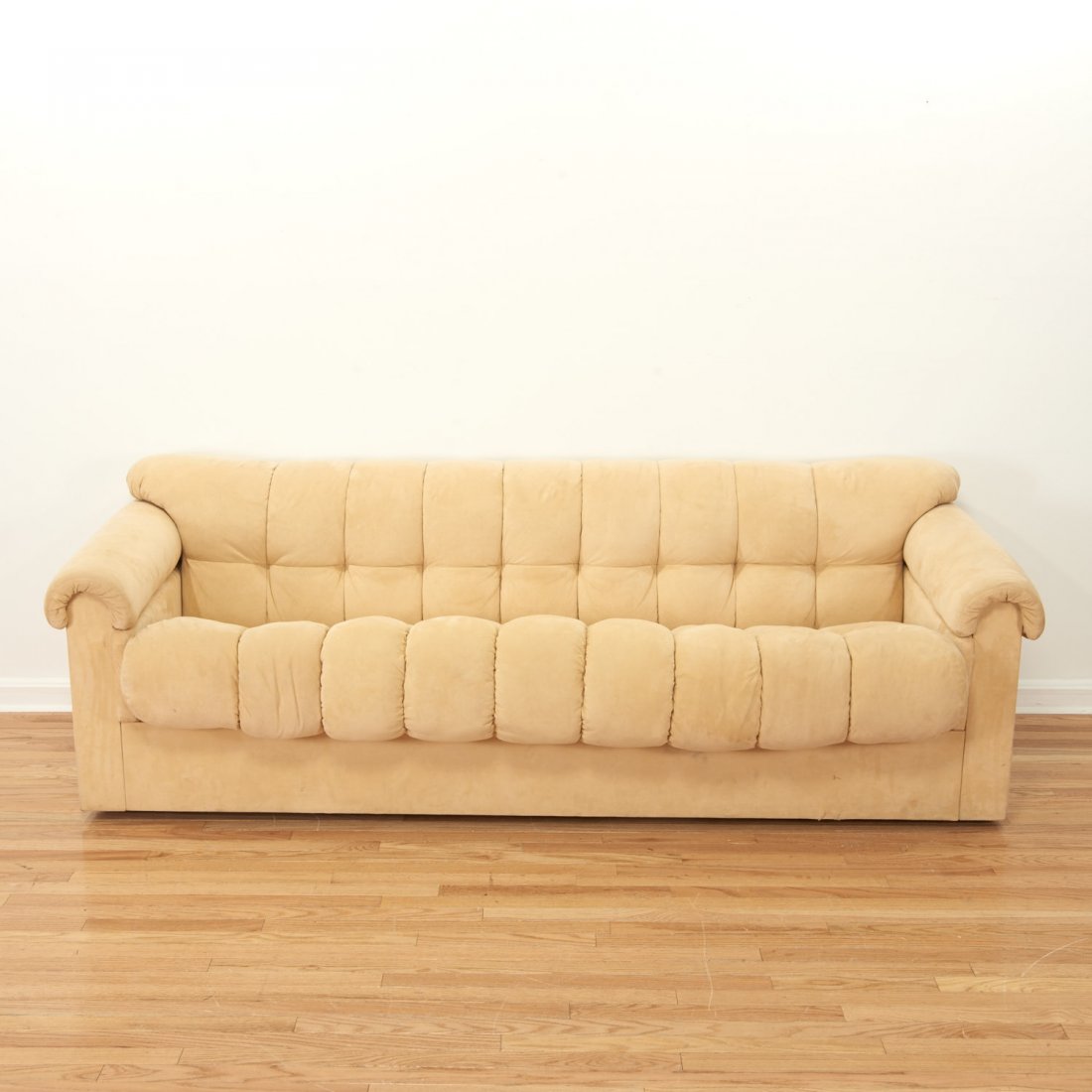Designer de Sede style tufted microsuede sofa: Designer de Sede style tufted microsuede sofa, Circa 1970s/80s, possibly Pace, or I4 Mariani, 27"h x 84"w x 38"d Provenance: Property removed from a Hewlett Bay, NY Estate - The waterfront Hewlett Bay
