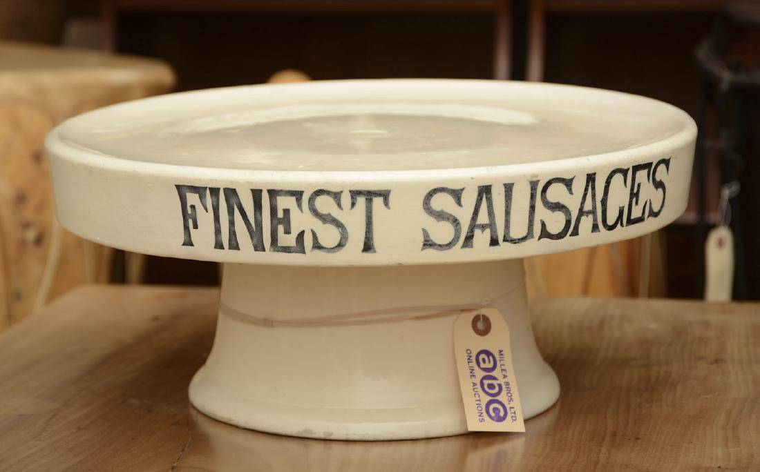Watson Bros. ceramic butcher's display: Watson Bros. ceramic butcher's display, 19th/20th c., "Finest Sausage", 7.5"h x 16.5"dia.