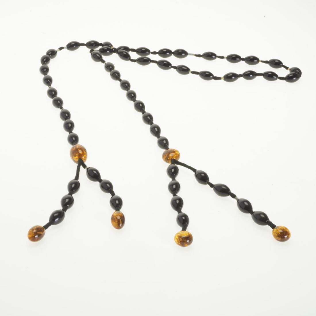 Garda Lynggaard, Monies statement necklace: Garda Lynggaard, Monies statement necklace, 20th c., signed, resin beads, tie closure, 70"l