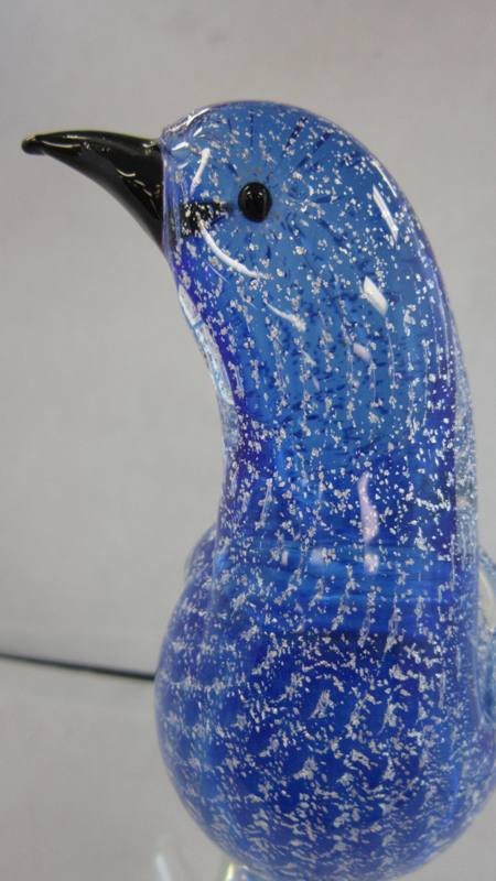 A LARGE MURANO HAND BLOWN BLUE BIRD: A LARGE MURANO HAND BLOWN BLUE BIRD Measures Approximately 12-1/4" tall with Silver Flex on Clear Base. Comes with Small Round Mirrored Pedestal. Weighs 2095grams.
