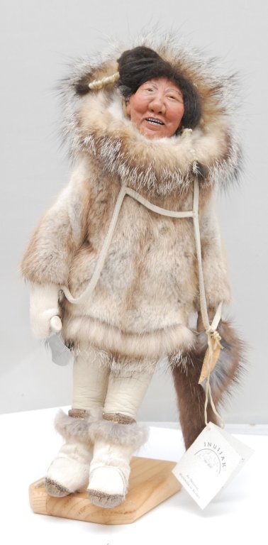 INUIJAK ORIGINAL ALASKAN ESKIMO DOLL: INUIJAK ORIGINAL ALASKAN ESKIMO DOLL Made by Linda Stadler. The Dolls Name is KooYoo and Stands Approximately 16" tall. Made with Caribou Horn, Fox coat, Muskrat parka, and Sheep Hair. With Original P