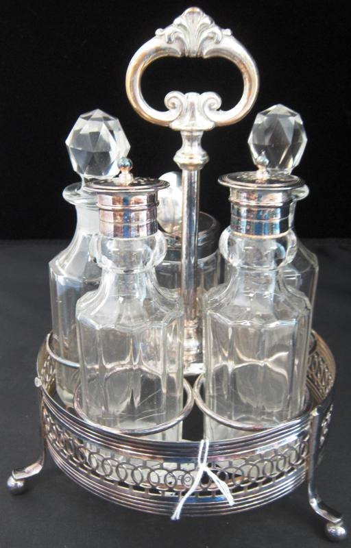 VICTORIAN SILVERPLATE AND CRYSTAL CONDIMENT SET: Stands 9" Tall. with Matching Cruets, Matching Shakers and Matching Mustard Jar with Stieff Sterling Baltimore Rose Spoon