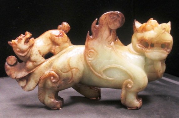 CHINESE JADE FOO LION WITH CUB: Han dynasty style Jade Foo Lion with Cub. Measures 9.5" Long. Weights: 1472.50 Grams