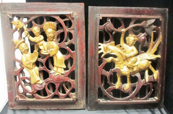 PAIR OF ANTIQUE CHINESE WOOD WALL PANELS: Modified from an old Chinese Cabinet these Wall Panels are 12" by 9" one panel depicts a scene of a Mythical Beast with a Warrior. The other Panel is that of a man, Woman, and Child