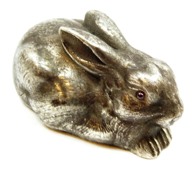 IMPERIAL RUSSIAN SILVER RABBIT FIGURE: Russian silver rabbit figure having cabochon cut garnet jewels set to eyes. Has town marks and 84 silver purity marks to bottom. Also hold Julius Rappaport workmaster marks to bottom. Measures 4 1/4" 