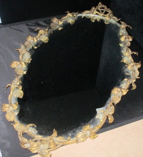 ANTIQUE DURE BRONZE SIGNED LADIES PERFUME TRAY: Beautiful Bronze Laidies Perfume Tray. Leaf Design around oval shaped mirror. Measures 24" by 14".