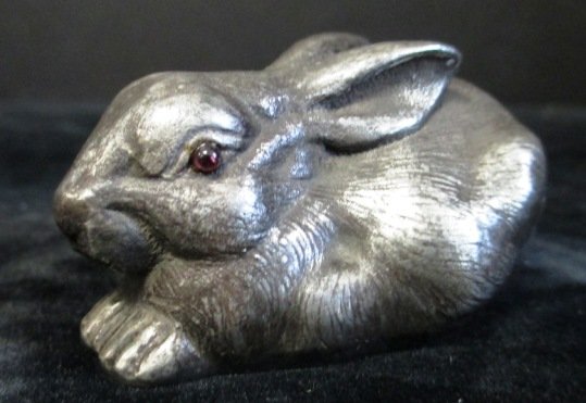 IMPERIAL RUSSIAN SILVER RABBIT FIGURE Russian silver: IMPERIAL RUSSIAN SILVER RABBIT FIGURE Russian silver rabbit figure having cabochon cut garnet jewels set to eyes. Has town marks and 84 silver purity marks to bottom. Also hold Julius Rappaport workma