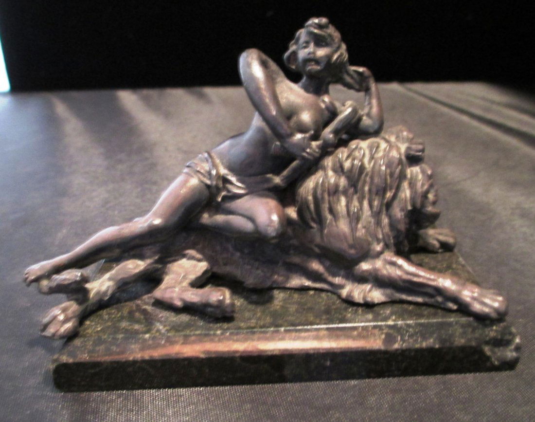 BRONZE STATUE OF LION AND LADY Small Bronze Statue of a: BRONZE STATUE OF LION AND LADY Small Bronze Statue of a Lion and Lady on Marble Base. Measures 4" Long by 3" Tall.