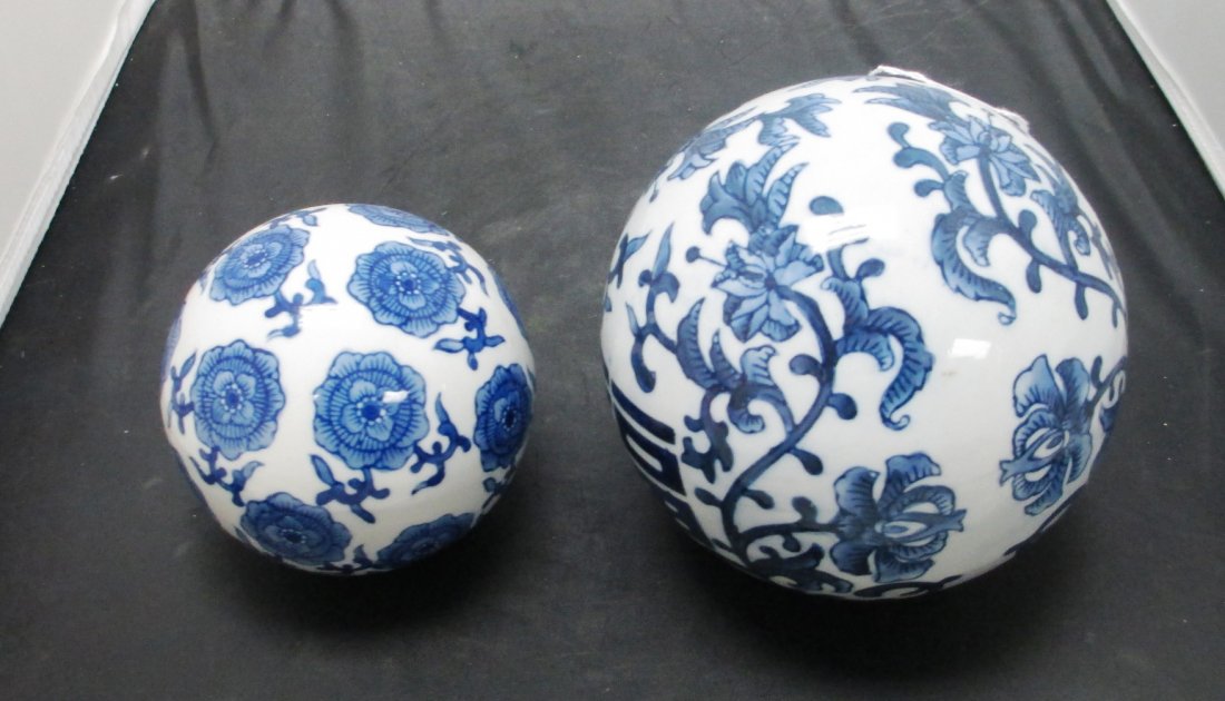 PAIR OF BLUE & WHITE PORCELAIN BALLS Japanese Floral: PAIR OF BLUE & WHITE PORCELAIN BALLS Japanese Floral Porcelain Balls. Comes with Japanese writing on each Ball. Large 1 measures 7" Diameter Small 1 measures 4 1/2"
