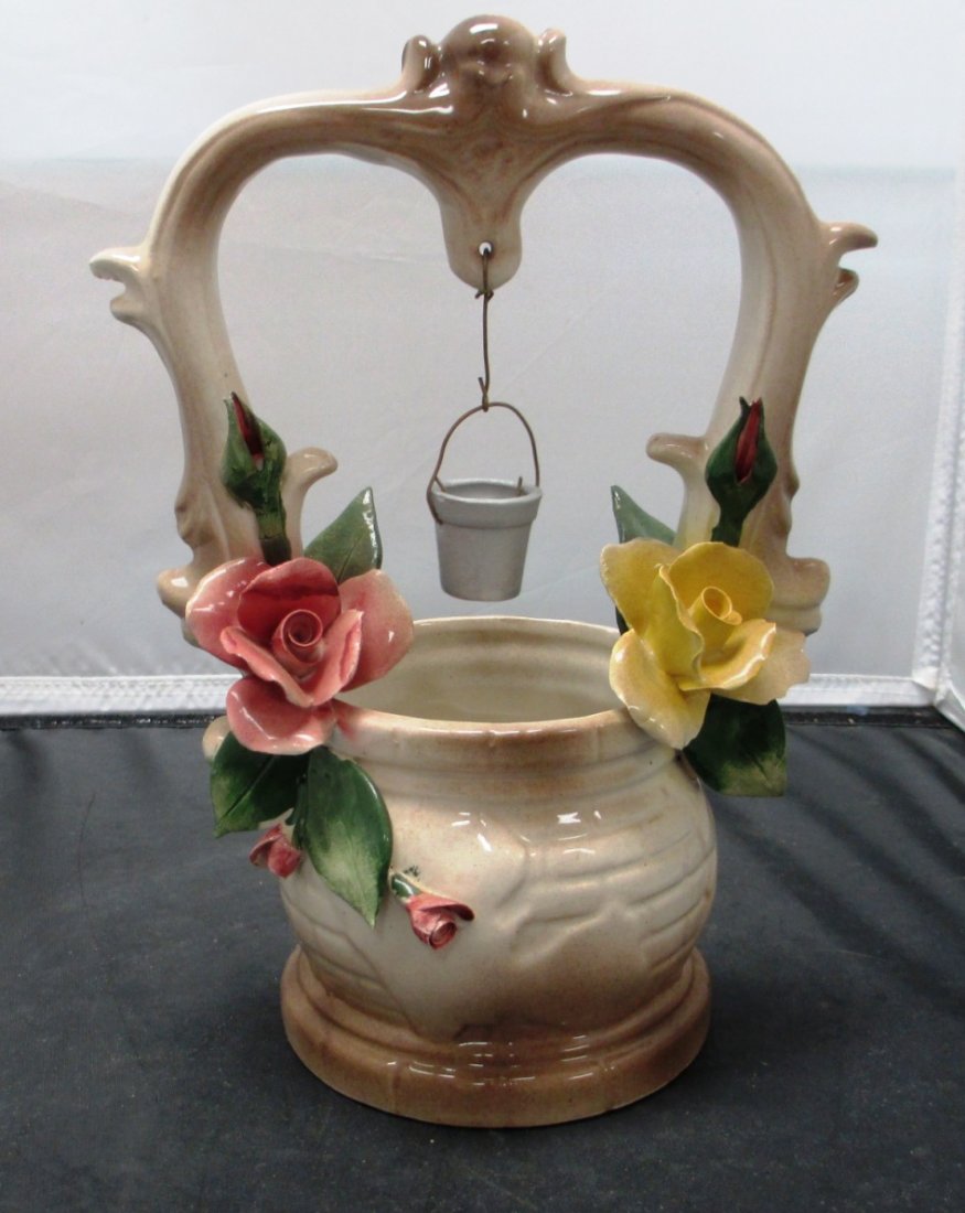 VINTAGE NUOVA CAPODIMONTE PORCELAIN WISHING WELL: VINTAGE NUOVA CAPODIMONTE PORCELAIN WISHING WELL Porcelain Wishing Well with Pink and Yellow Roses. Measures 10-1/4" TALL AND 6-1/2" WIDE.