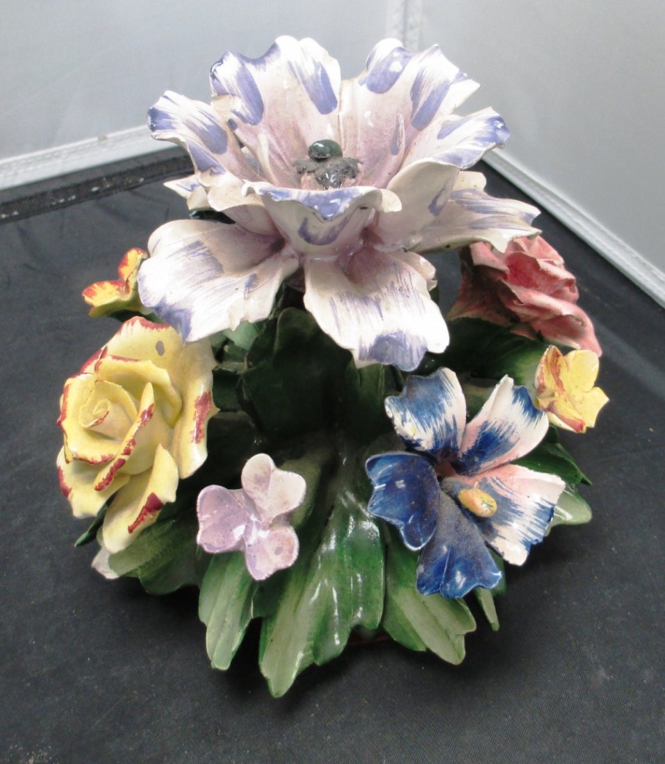 LARGE CAPODIMONTE FLORAL CENTER PIECE: LARGE CAPODIMONTE FLORAL CENTER PIECE Porcelain Capodimonte Center Piece with 8 Flowers and Large Middle Rose. Measures 7" Tall by 7" Wide.