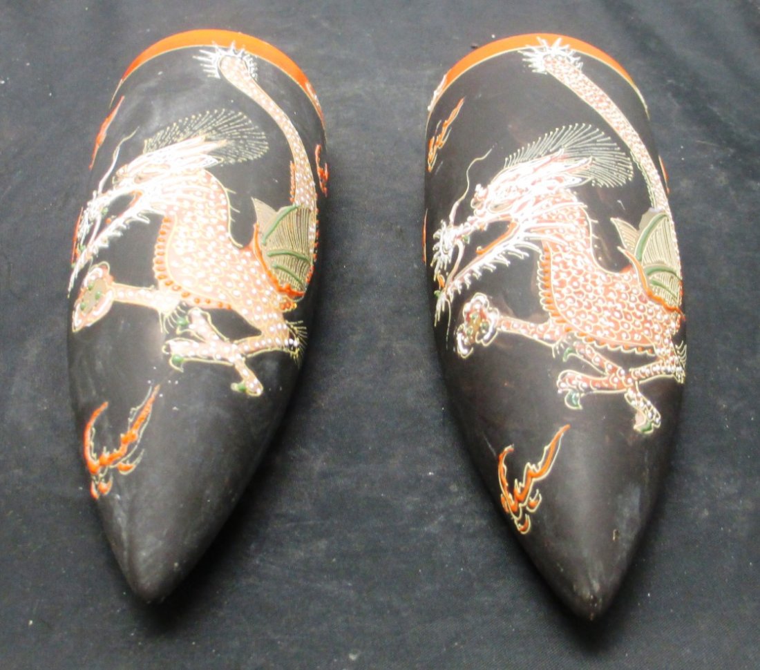 CHINESE CERAMIC PAIR OF DRAGON SCONCES: CHINESE CERAMIC PAIR OF DRAGON SCONCES Dragon motiff Wall sconces for Flowers Multi Color Brown, Orange, and Gold. Measures 9" long