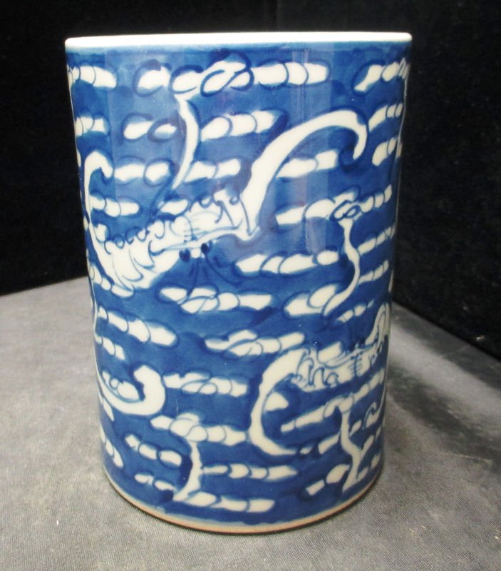 CHINESE BLUE AND WHITE PORCELAIN BRUSH POT: Antique Brush Pot has Qinglong mark on Bottom. Brush Pot depicts symbols of harmony and Buddhism. Measures 3 1/2' Diameter and 5" Tall weights 413.8 Grams.