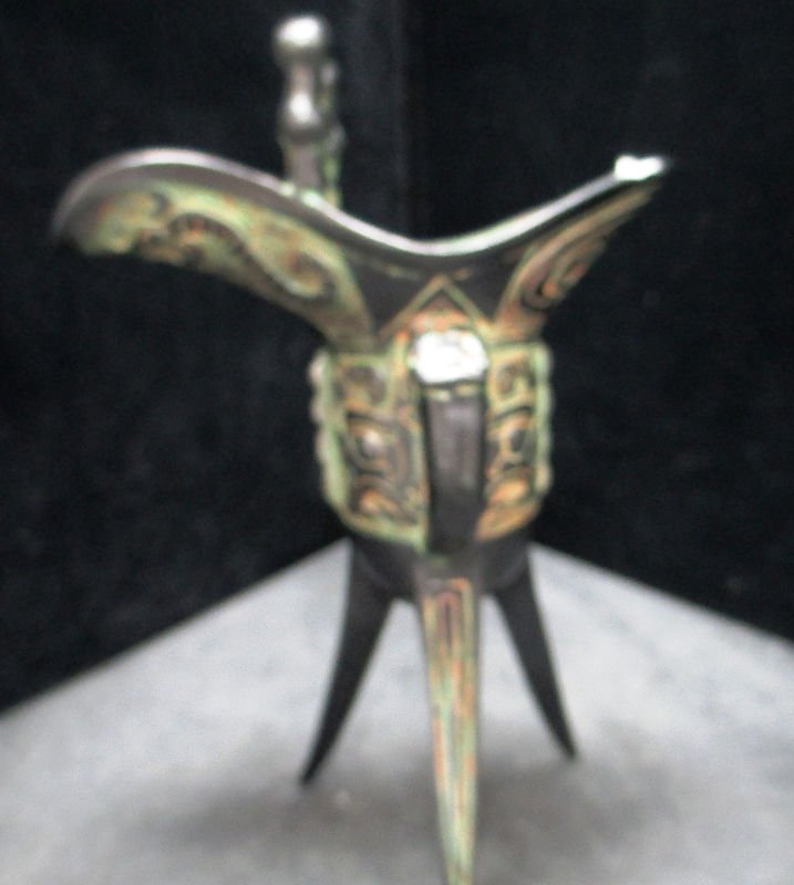 CHINESE ARCHAIC STYLE TRIPOD URN: Depiction of Warring States and Han Dynasty figures . Measures 7" Tall