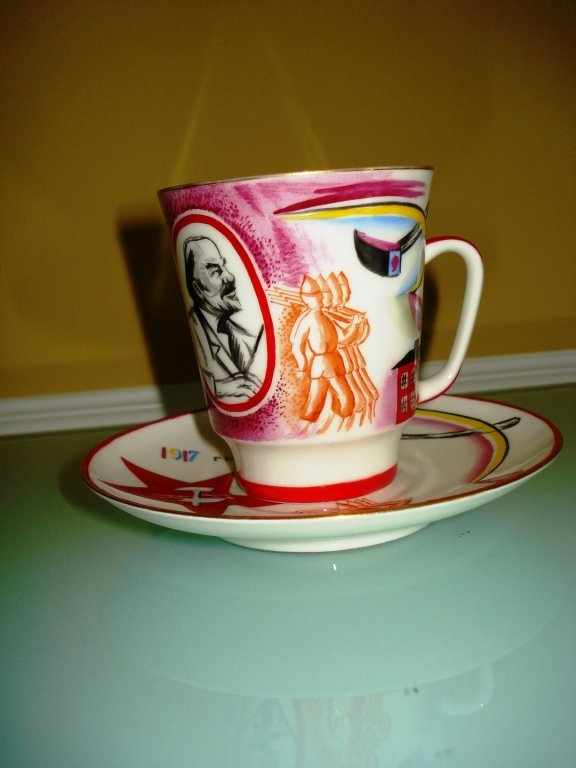 RUSSIAN PORCELAIN AVANTGARDE SET: Russian PORCELAIN Avantgarde Set Measure: 4 3/4" - plate, 3 1/4" - cup