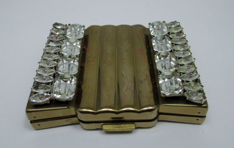 MAKE-UP POWDER COMPACT CASE WITH MIRROR: MAKE-UP POWDER COMPACT CASE WITH MIRROR AND CLEAR STONES. MADE BY VOLUPTE.