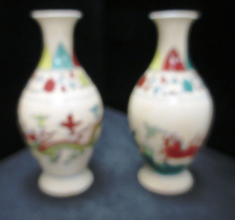 PAIR OF CHINESE PORCELAIN GUANGXU MARKED VASES: One Vase has Dragons with Floral the other has Horses with Floral. Each bears the mark of Guangxu Dynasty on Bottom. Measures 9" Tall each weights 305.5 Grams.