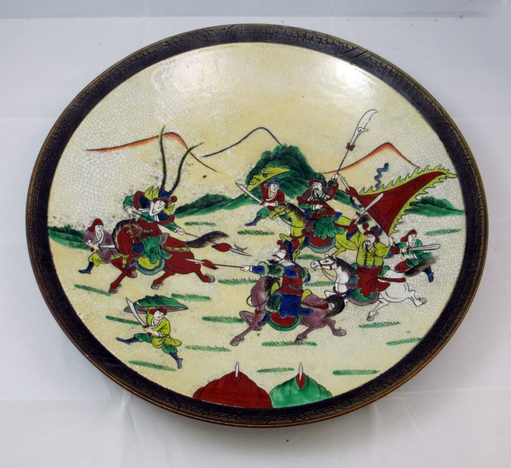 CHINESE CHENG HUA MING DYNASTY PORCELAIN CHARGER: Large Charger depicting Medieval Battle Scenes. Warriors on Horse Back with Spears and Swords fighting with Foot Soldiers carrying Swords, and Shields. Measures 15 1/2" Diameter. Comes with 4 Cheng Hu