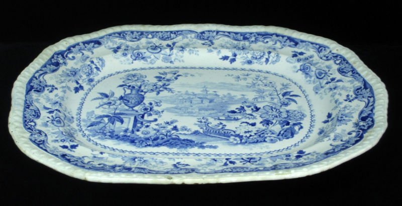 1830's BLUE & WHITE JONES PORCELAIN TRAY: Oriental Beauties this magnificent Tray dates to the 1830's. Floral and Scroll motif with depiction of Castle with Lake, Flowers, adn Urn. Measures 14 1/2" Long by 12" Wide. Stamped on bottom "Orienta