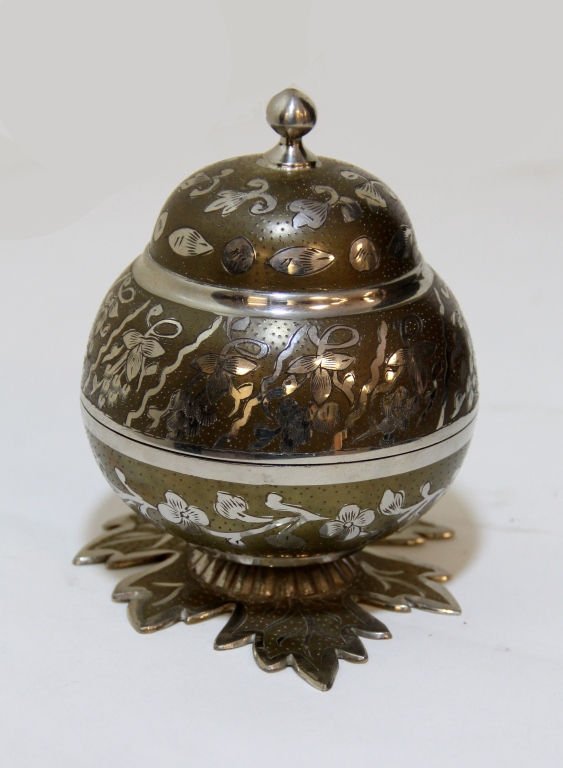 VINTAGE SWISS METAL MUSIC BOX: Round Bell style Shape with bottom bowl standing on Leaf. Comes with Thorens movement. Measures 5 1/2" Tall