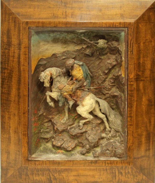 19TH CENT METAL ORIENTALIST WALL PLAQUE BY HARDY: Orientalist 19th Century Metal Wall Plaque. The unusual 19th oak framed plaque depicts a scene of an Arabian warrior on horseback in a mountainous setting. Signed lower right "Hardy".The oak frame has