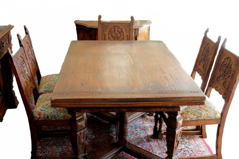1920'S 10PC SPANISH DINING ROOM SET: Dining Room Table and 6 Tapestry Patterned Chairs Table measures 41" by 62" by 32" Tall Large Wood carved Buffet measures 60" by 20" Depth by 37" Tall Glass and Wood Cabinet measures 62" Tall by 36" L