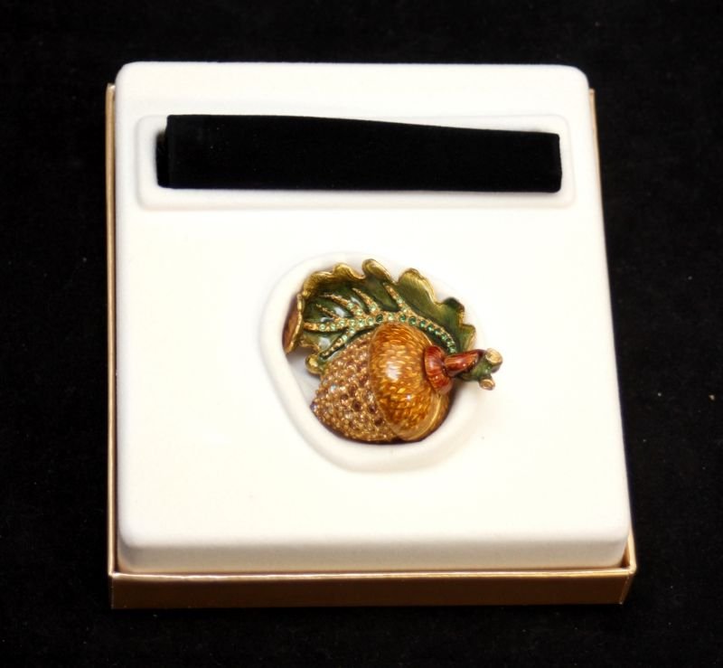 ESTEE LAUDER PERFUME ACORN COMPACT, STRONGWATER: Estee Lauder 'Glistening Acorn' figural compact for solid perfume designed by Jay Strongwater. Number 1W22X21001. Unused condition. Includes original fitted box and outer cover box. Originally purchas